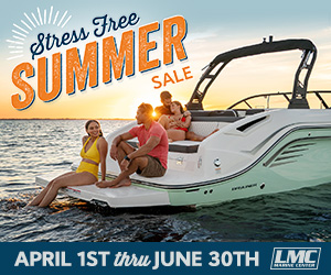 Family hanging out on a Sportsman® Open 282 CC boat anchored in the water